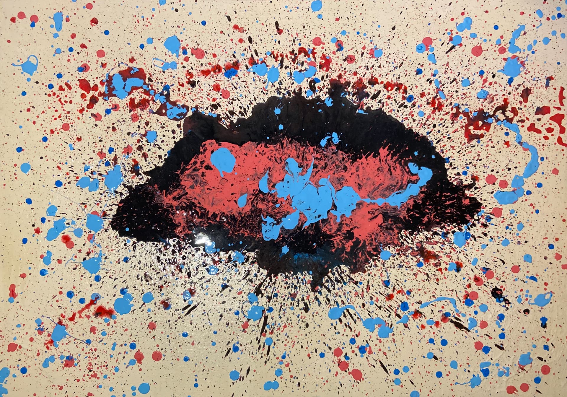 Splatter painting with black, red and blue bursts on cream ground